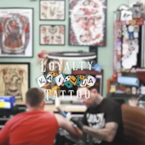 Loyalty Tattoo Shop Interior Photo with Logo