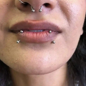 Loyalty Tattoo piercing example, snake bites, septum