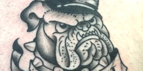 Black and white devil dog tattoo