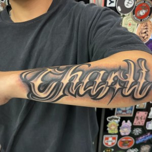 Text tattoo by Isaiah