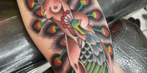 Neo traditional naked lady tattoo by Kawika