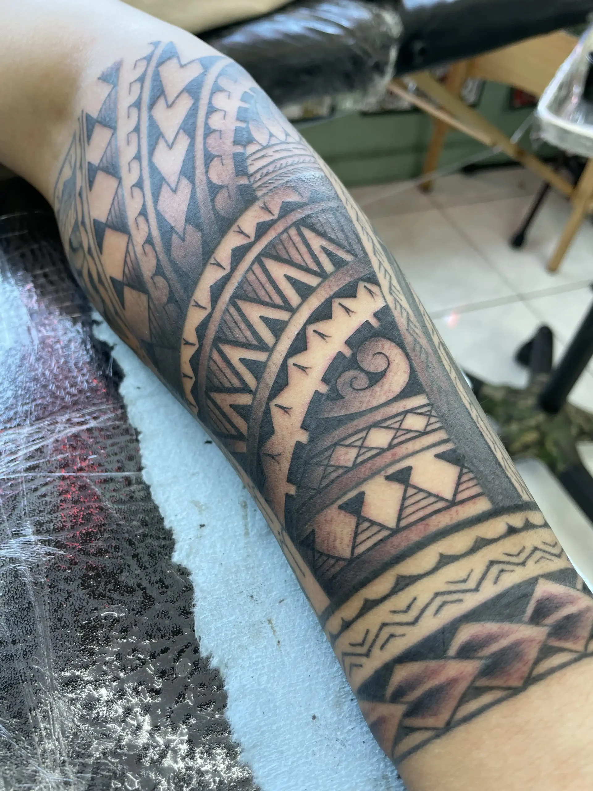 Pacific half sleeve tattoo by Kawika