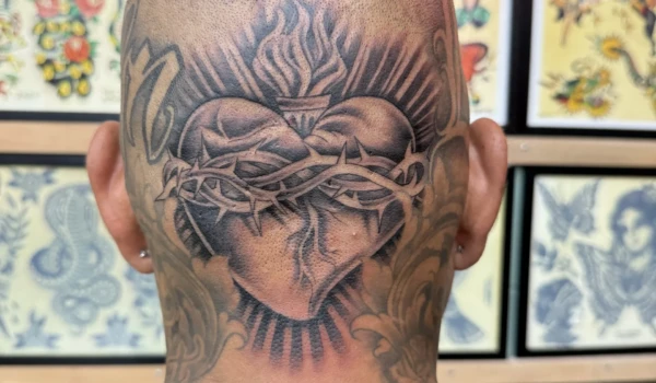 traditional heart tattoo by Kawika
