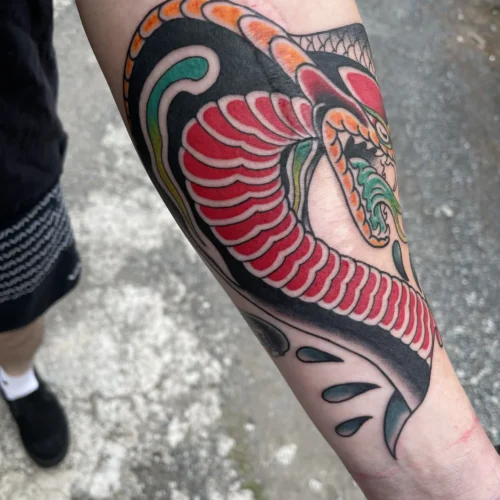 Traditional cobra tattoo by Kawika