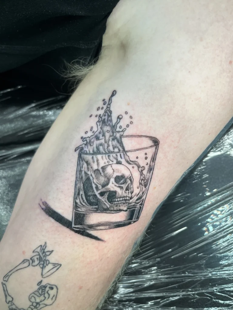 Realism skull in glass tattoo by Lumpy