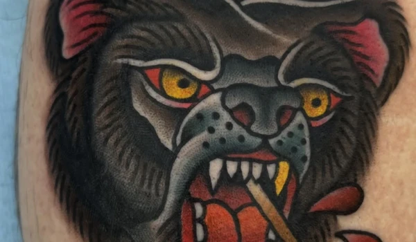 bear and arrows tattoo