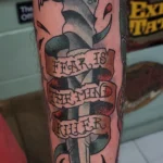 blade script tattoo
