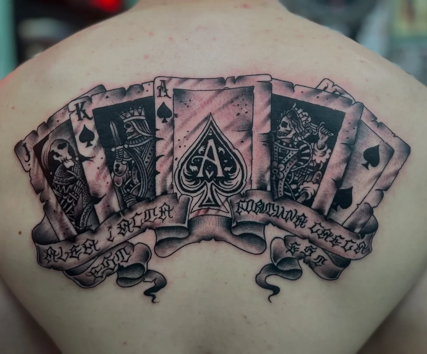 back poker tattoo